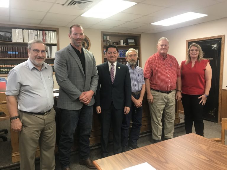 The Saline County Commission held a session Wednesday, Aug. 31, and discussed the recently awarded $1.6 million Economic Development Administration grant. Pictured left to right are: Norm Lucas, executive director of PTRPC; Kurtis Gregory, District 51 Missouri House of Representatives; Israel Baeza, chairman of PTRPC and Pettis County Commission representative; Mark Belwood, prairie land contributor; Saline County Presiding Commissioner Kile Guthrey; and Saline County Northern Commissioner Stephanie Gooden. Not pictured is Saline County Southern Commissioner Monte Fenner. Danielle Linton-Hatfield/Democrat-News
