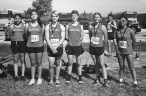 Seven Marshall High School runners competed at the Smith-Cotton Invitational Saturday, with three of them earning medals. From left: Rebecca Gonzalez, Ingrid Aguilar, Nick Shireman, Saxon Post, Eliza Papreck and Jaedyn Borja. Not pictured: Matthew Pomerenke. Contributed image