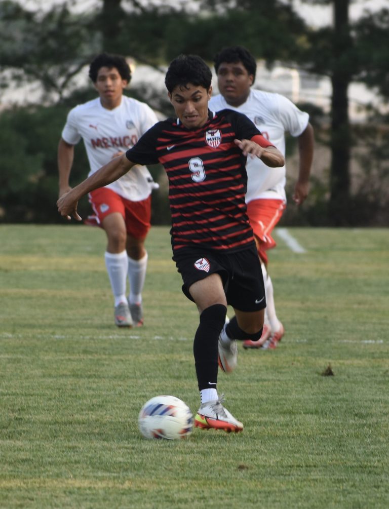 Marshall senior Derick Juarez scored a natural hat trick, leading the Owls to a 9-1 win over visiting Mexico in a North Central Missouri Conference match Tuesday. Hobby King/Democrat-News