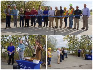 The Saline County Commission on Tuesday afternoon, Oct. 11, attended a ribbon-cutting ceremony for the Marshall Junction located by Interstate 70 and U.S. Highway 65. Also in attendance were representatives from the Missouri Department of Transportation, contractors and local landowners who contributed to the project. Fifteen people participated in the cutting of the ribbon after speeches were made. Pictured on the bottom left (left to right) are Saline County Northern Commissioner Stephanie Gooden, and Ben McCabe, Missouri Department of Transportation area engineer, who hear Ed Hassinger speak on behalf of the junction project. Hassinger is the MoDOT chief engineer. Photos by Danielle Linton-Hatfield/Democrat-News