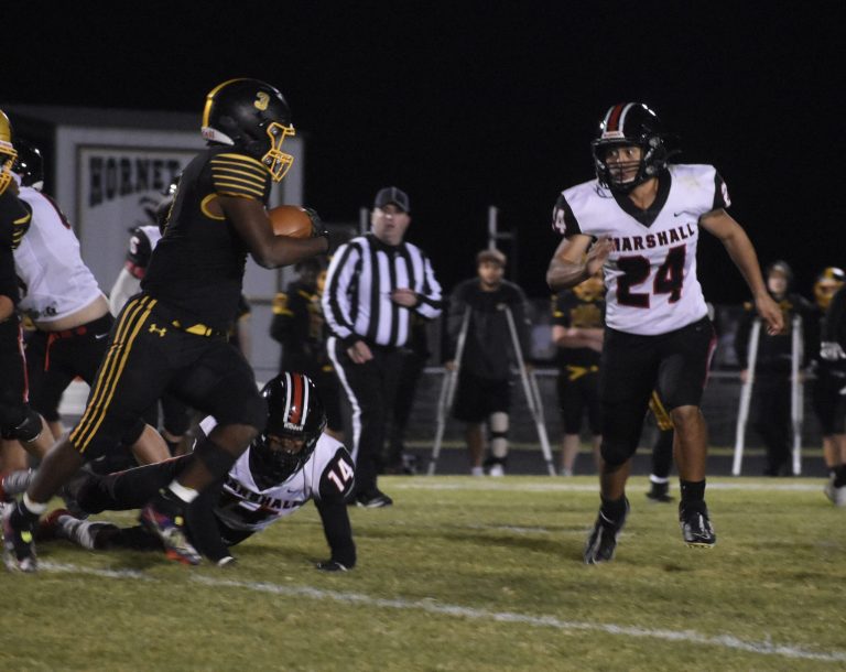 Owls’ sophomore cornerback Mason Evans (24) tries to chase down Fulton senior running back Tyreion Logan. Evans and the MHS defense held the Hornets to 18 yards rushing and 228 total yards in a 38-8 NCMC road win Friday. The 2-5 Owls host 5-2 Hannibal at 7 p.m. Friday. Hobby King/Democrat-News