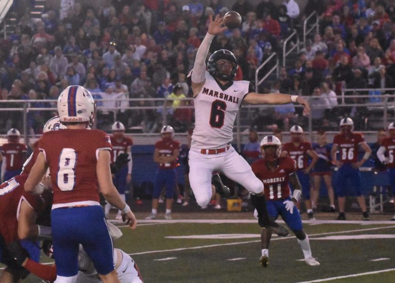 Owls’ junior Brenden Marquess (6) leaps to try to deflect a pss versus Moberly. Marshall limited the Spartans’ offense to one touchdown, and MHS’ offense did the rest in a 17-7 win last Friday. The Owls go for win No. 2 at Fulton at 7:30 p.m. Friday. Hobby King/Democrat-News