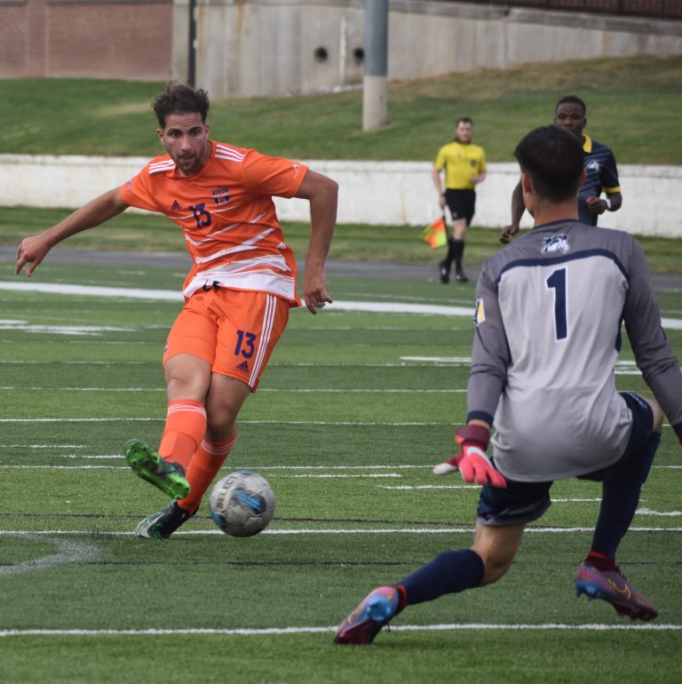 Missouri Valley junior forward Lorenzo Fagiani (13) puts a shot past the Mount Mercy goalkeeper for an insurance goal in the Vikings’ 3-1 Heart of America Athletic Conference victory on Gregg-Mitchell Field in Marshall Wednesday. The No. 5-ranked Vikings improved to 7-2-1 overall and 5-1 in the league. The Vikings play another HAAC match at Clarke in Dubuque, Iowa, Saturday. Hobby King/Democrat-News