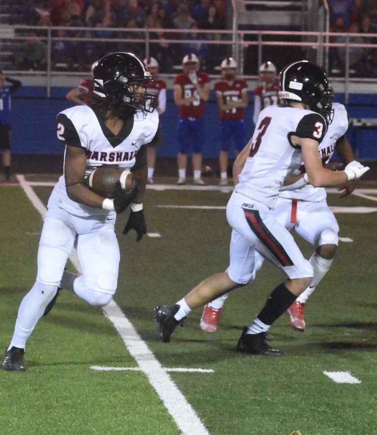 Marshall senior Christian Tatum (2) returns a kickoff versus the Moberly Spartans. Although neither of his kickoff returns went the distance, Tatum scored two touchdowns on passes from junior Jaxson Case, leading the Owls to their first win of the season, 17-7 Friday. Hobby King/Democrat-News