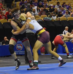 Marshall junior Brenden Marquess (left) attempts to throw Logan-Rogersville senior Beau Thompson in their first-round bout at 157. Thompson edged Marquess 5-4. (Hobby King/Democrat-News )