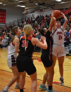 Lady Owl senior Drew Wilson (24) tries to score against Hannibal. Wilson had one point, and Marshall lost the NCMC game 53-19 at home Friday. (Hobby King/Democrat-News)