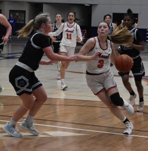 Valley senior Brecon Antrillo drives to the basket to try to score versus Peru Stae. Antrillo led three Lady Vikings in double-figure scoring with 20 points, and the won the game 79-60 on Senior Day Saturday in Marshall. (Hobby King/Democrat-News)