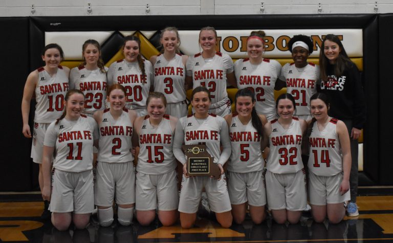 The Santa Fe Lady Chiefs’ basketball team captured the Class 1, District 13 championship Saturday with a 69-59 victory over Braymer at Norborne. Pictured (from left) are: front, Laney Ballenger, Molly Malter, Atleigh Lark, Jasmine Russell, Ava Schmidt, Abbi Mueller, Sami Mueller; back, Addi Mullins, Mia Lark, Braylin Klein, Emma Michael, Kam Dankenbring, Brooke Dierking, Lilly Plattner and Brilee Dierking. (Hobby King/Democrat-News)
