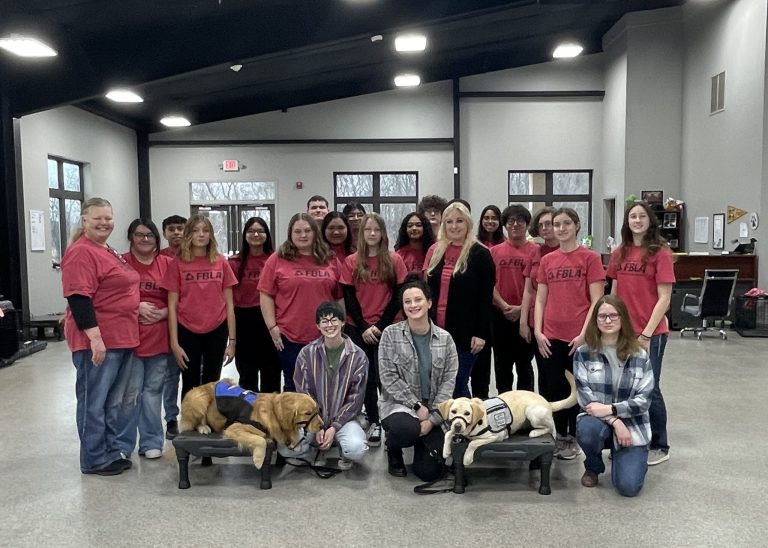 SCCC FBLA members met service dogs (pictured) at Retrieving Freedom, which trains dogs for veterans and children with autism. Contributed image
