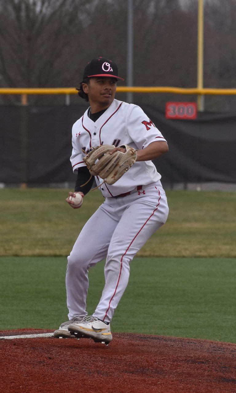 Owl senior Jayden Edmund delivers a pitch versus Carrollton. Edmund threw less than 30 pitches in two scoreless innings. He struck out three and allowed two hits. (Hobby King/Democrat-News)