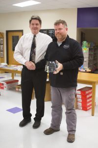 During the Slater School Board meeting Tuesday, Feb. 28, Central MO AgrService was recognized as Partners in Education. Board Secretary Tedd Wiseman (right), representing CMAS, accepts the plaque from Superintendent Terry Lorenz (left). Danielle Linton-Hatfield/Democrat-News