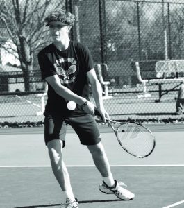 Owl junior Joseph Leavitt returns a shot versus Columbia Independent Tuesday. Leavitt and junior Connor Slusher teamed up to win the No. 2 doubles match 8-4. The Owls won the overall match 7-2. (Hobby King/Democrat-News)