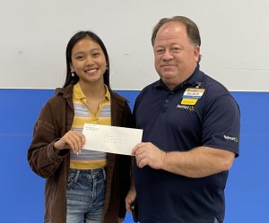 Pictured left to right: Jaedyn Borja and Walmart Store Manager Wilbur McCoy. Contributed image