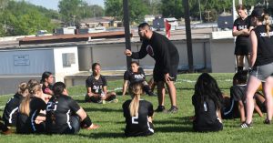 Marshall first-year head coach Duglas Lopez gives instructions to his team during a passionate halftime talk. The Lady Owls came up just short in losing 2-1 to Hannibal and missed out on claiming a share of the North Central Missouri Conference title. (Hobby King/Democrat-News)