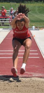 Lady Owl sophomore Shelley Thompson stretches out to 10.96 meters (35 feet, 11.5 inches) in the triple jump. She finished fourth at the sectional meet, earning a spot at state. (Hobby King/Democrat-News)