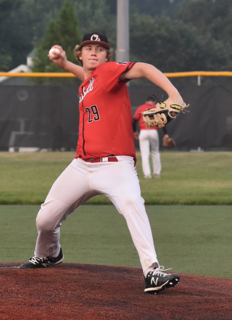 Brody Kueker delivers a pitch during the Marshall Travelers’ 18-5 home victory over the Sedalia Legion Post 642 freshman team Monday at Marshall High School. Kueker was the winning pitcher. He allowed four runs (two earned) on three hits and three walks, while whiffing six in three frames. (Hobby King/Democrat-News)