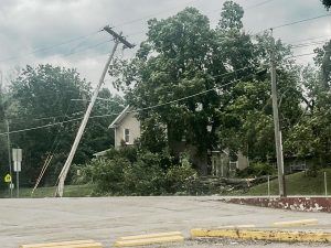 A utility pole snapped on the corner of Eastwood and Bell streets during a storm Saturday, July 29. (Danielle Linton-Hatfield/Democrat-News)
