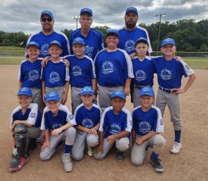 The LaCoMo East 9U Minor League all-star baseball team swept through the District 1 Tournament, winning the championship in Marshall Saturday. Pictured (from left): front, Ryan Cooper, Maddox Schull, Jesse Cramer, Bryce Thomas, Kasyn Knight; middle, Jaxon Bredehoeft, Jayden Bredehoeft, Skyler Strange, Kye Fowler, Declan Wilson, Cason Glenn; back, coaches Matt Schull, Britt Hasselbring, Eric Bredehoeft. LaCoMo East will play in the state tournament July 20-23 in Columbia. (Contributed image)
