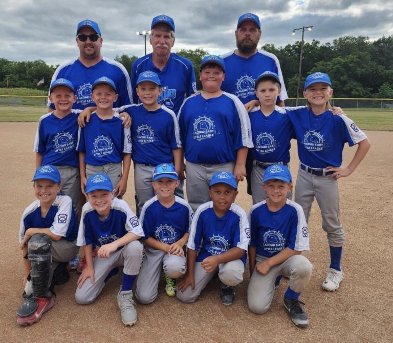 The LaCoMo East 9U Minor League all-star baseball team swept through the District 1 Tournament, winning the championship in Marshall Saturday. Pictured (from left): front, Ryan Cooper, Maddox Schull, Jesse Cramer, Bryce Thomas, Kasyn Knight; middle, Jaxon Bredehoeft, Jayden Bredehoeft, Skyler Strange, Kye Fowler, Declan Wilson, Cason Glenn; back, coaches Matt Schull, Britt Hasselbring, Eric Bredehoeft. LaCoMo East will play in the state tournament July 20-23 in Columbia. (Contributed image)