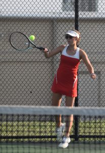 MHS senior Alizah Russell returns a shot in her match versus Mexico. Russell outlasted junior Lucita Gleeson 11-10 (7-4), helping the Lady Owls to a 7-2 NCMC win Tuesday. (Hobby King/Democrat-News)