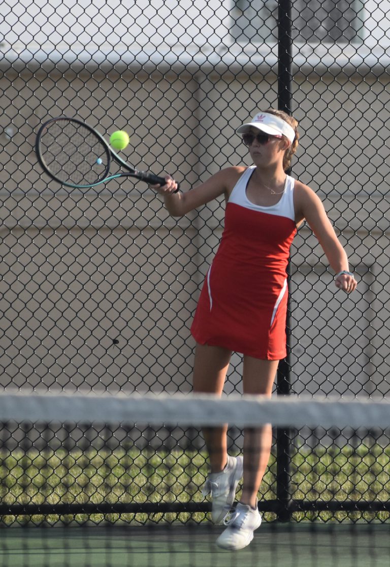 MHS senior Alizah Russell returns a shot in her match versus Mexico. Russell outlasted junior Lucita Gleeson 11-10 (7-4), helping the Lady Owls to a 7-2 NCMC win Tuesday. (Hobby King/Democrat-News)