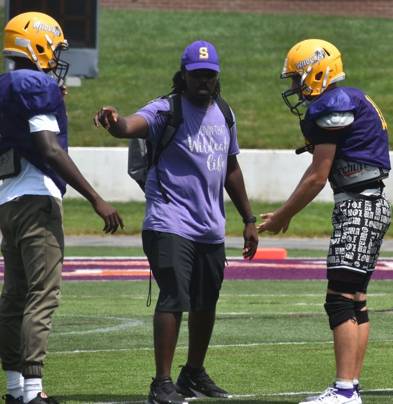 Co-head coach Aric Falls (middle) gives instructions to Brandon Terrill (left) and Grayson Zdybel during a jamboree-type scrimmage at Missouri Valley College in Marshall in late July. The Wildcats reported for their first practice Monday. The 2023 season will be Slater’s first-ever in 8-man football as a member of the North Division of the Central River League. (Hobby King/Democrat-News)