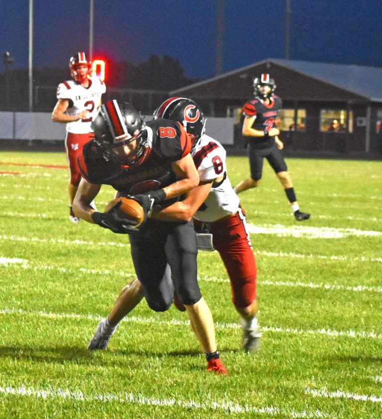 Marshall senior Jaxson Case rushed for 165 yards and three TDs, leading the Owls to a 19-13 victory over the Chillicothe Hornets Friday. (Hobby King/Democrat-News)