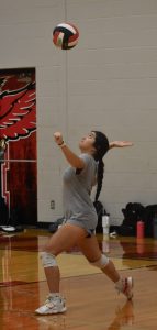 Senior defensive specialist Nicole Quintana prepares to serve during a Lady Owls’ volleyball practice. Quintana is one of six seniors on the varsity squad. Marshall opens its season at Sacred Heart in Sedalia Monday, Aug. 28. The home opener is an NCMC matchup against Kirksville Tuesday, Aug. 29. (Hobby King/Democrat-News)