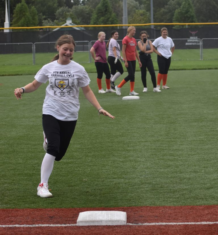 Perfecting base running skills, sophomore Taylor Fann rounds third and heads for home. The Lady Owls open the season hosting the Marshall Tournament Saturday at the Marshall Sports Complex. The four-team, round-robin event begins at 9 a.m. (Hobby King/Democrat-News)