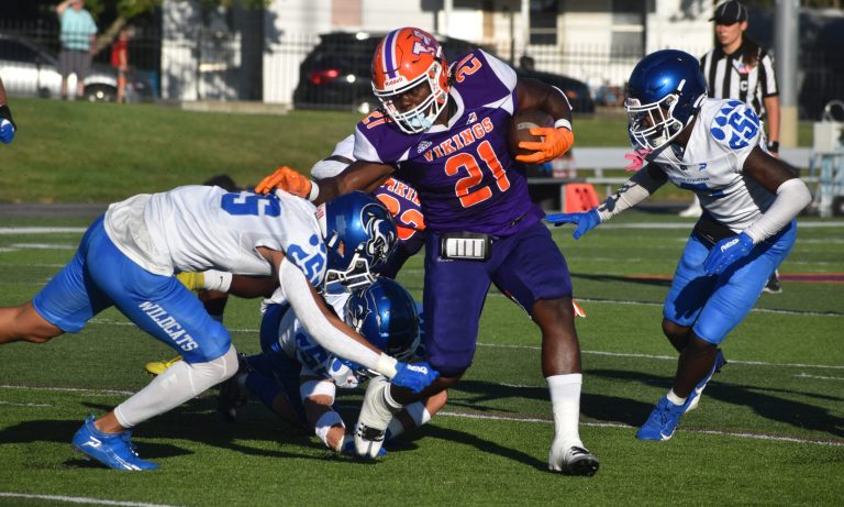 MVC senior Jeremiah Bryant pulls away from a Culver-Stockton defender. Bryant rushed for 76 yards and a touchdown in the Vikings’ 28-7 win on Gregg-Mitchell Field Saturday night. (Hobby King/Democrat-News)