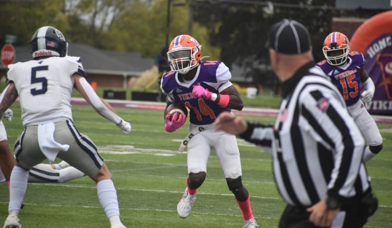 Valley junior Bishop Hill (14) returns one of three interceptions for the Vikings in the second half versus the Missouri Baptist Spartans. The Vikings overcame a 13-7 halftime deficit to win the HAAC South Division game 35-20 on Gregg-Mitchell Field in Marshall. (Hobby King/Democrat-News)