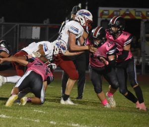 Marshall senior Caiden Reyes (20) is ready to hit a Spartan ball carrier. Reyes finished with an assisted tackle and a tackle for loss, but Moberly scored the last 22 points of the game and won 36-14 on Cecil Naylor Field last Friday. (Hobby King/Democrat-News)