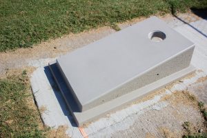 Pictured above is one of the cement cornhole planks donated by the Marshall Optimist Club for Indian Foothills Park. Danielle Linton-Hatfield/Democrat-News