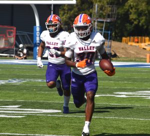 Valley sophomore Jeremiah McNair (30) returns an interception. McNair finished with one solo tackle, a forced fumble and fumble recovery to go with the pick, but the Vikings lost 48-31 at Peru State Saturday. (Hobby King/Democrat-News)