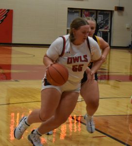 Lady Owl junior Haylee Lent makes a move toward the basket versus Smith-Cotton. Lent scored four points, but Marshall lost the season opener 55-43 Monday at MHS. (Hobby King/Democrat-News)