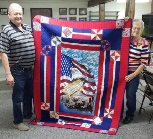 Robert “Keith” Kavanaugh (left) is presented a Quilt of Valor on Thursday, Nov. 14. Contributed image