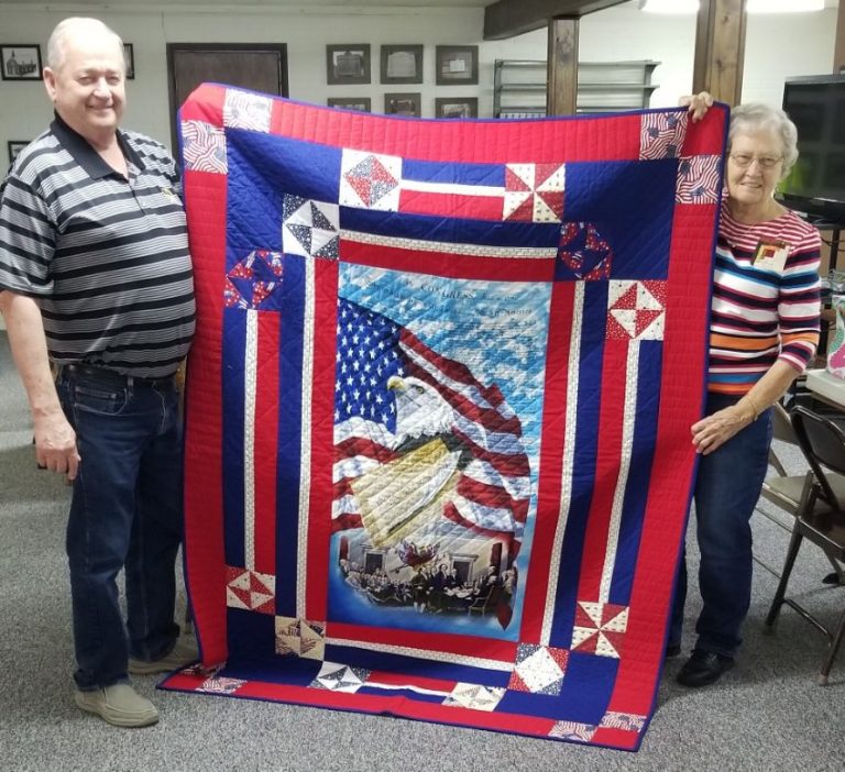 Robert “Keith” Kavanaugh (left) is presented a Quilt of Valor on Thursday, Nov. 14. Contributed image