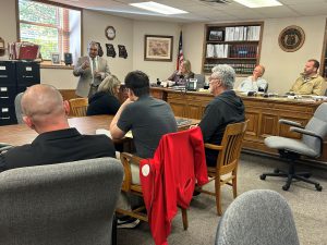 Missouri State Treasurer Vivek Malek speaks to Saline County leaders and community members on MOBUCK$ Program on Halloween. Contributed image