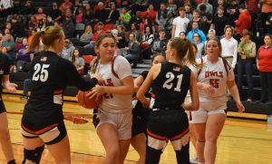 Lady Owl junior Brooklynn Davenport (21) barges down the paint to try to score versus Knob Noster. Davenport scored 26 points and ripped down 21 boards in a 62-55 loss Monday. (Hobby King/Democrat-News)