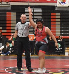 Lady Owl junior Sherlyn Solano was all smiles after pinning her opponent in the 235-pound bout. (Hobby King/Democrat-News)