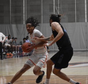 MVC junior J’Luan Patterson (left) pumped in a team-high 16 points and pulled down eight rebounds in the Vikings’ 81-58 win at Grand View in Des Moines Saturday. The win meant Valley made it into the HAAC post-season tournament for the first time since the 2019-20 season. (File Photo — Hobby King/Democrat-News)