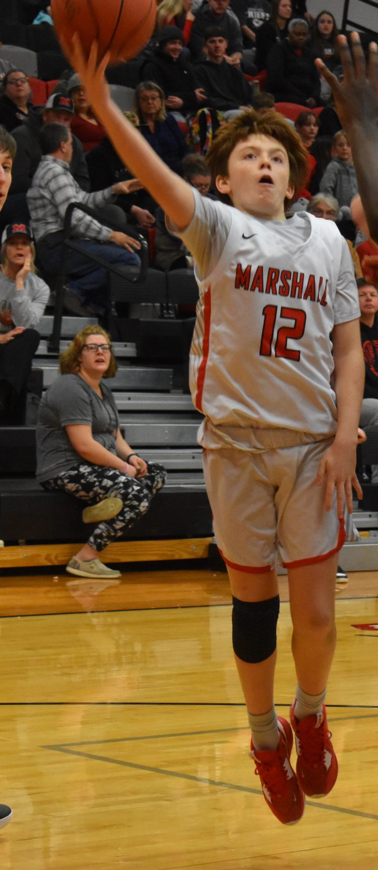 MHS freshman Kane Viquesney closed out his first year of high school basketball with two three-point baskets and a 10-point performance in the Owls’ 71-56 district loss to Boonville Feb. 27. (File Photo — Hobby King/Democrat-News)