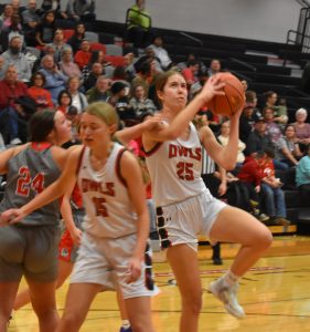 Lady Owl senior Kiki Simic makes a move to the basket to score two of her team-high 19 points, but Marshall lost to Mexico 45-39 at home Monday night. (Hobby King/Democrat-News)