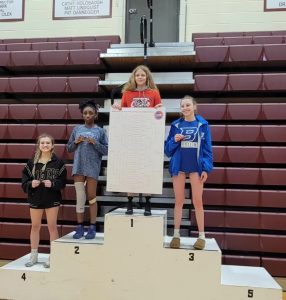 Lady Owl freshman McKenzy Mason (third from left) won the Class 1, District 2 title in the 100-pound weight class Saturday. (Contributed image)