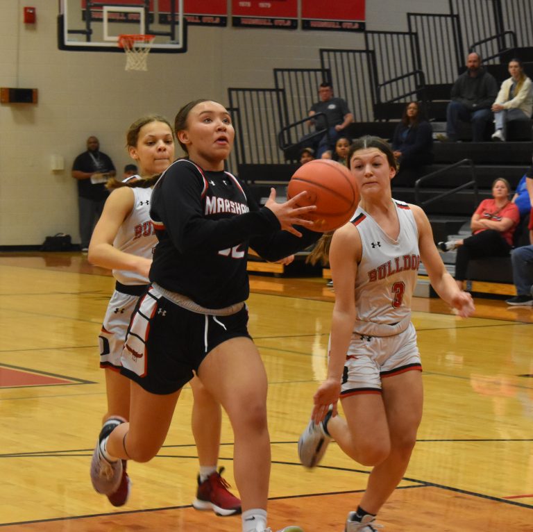 After she stole the ball near mid-court, freshman Nevaeh Campbell drives in to score two of her 13 points in the Lady Owls’ 54-52 loss to Odessa in the first round of district play Monday at MHS. (Hobby King/Democrat-News)