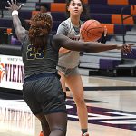 Lady Viking senior Gia Moore (1) gets set to attempt a three-pointer versus Graceland. Moore connected four times from distance and scored 18 points to give her 1,501 points in her career. She broke the previous program scoring record of 1,497, set by Michele (Renschin) Reinke during 1993-97. (Hobby King/Democrat-News)