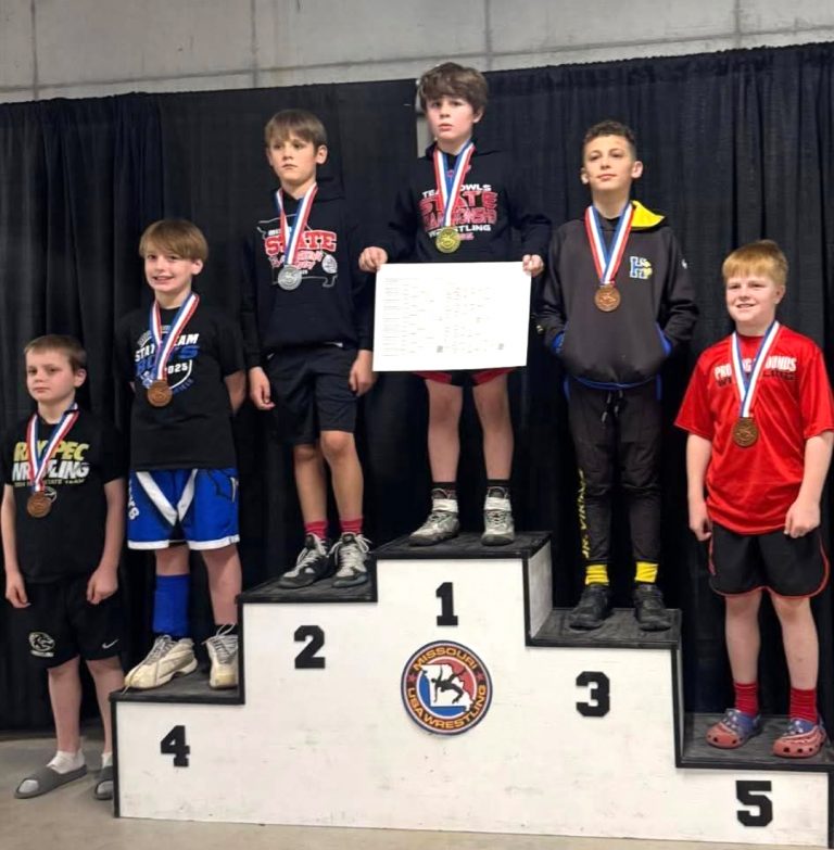 Marshall’s Vincent Jacobi (middle) captured first place in the 95-pound, 10U bracket. (Contributed image)