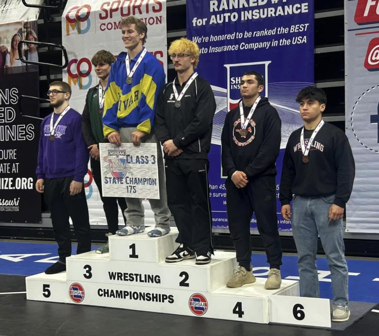 Marshall’s Mason Evans (right) earned his first medal at the Missouri State High School Championships last Saturday at Mizzou Arena in Columbia. The senior, wrestling in the 175-pound weight class, brought home sixth place in the Class 3 Tournament. (Contributed image)